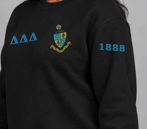 Delta Delta Delta premium embroidered black solid crewneck sweatshirt on model - founding year sleeve detail