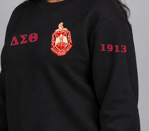 Delta Sigma Theta premium embroidered black solid crewneck sweatshirt on model - founding year sleeve detail