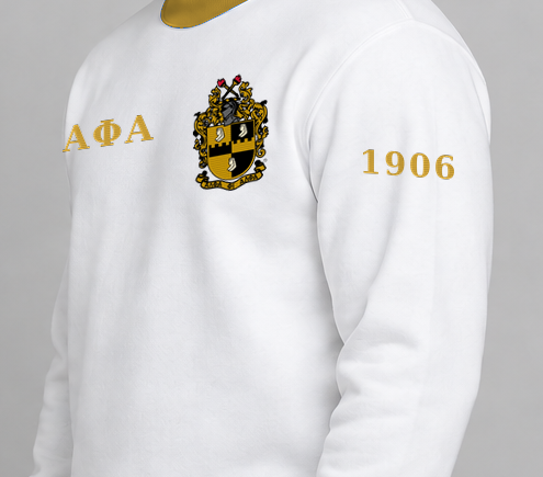 Alpha Phi Alpha premium embroidered white solid contrast trim crewneck sweatshirt on model - founding year sleeve detail