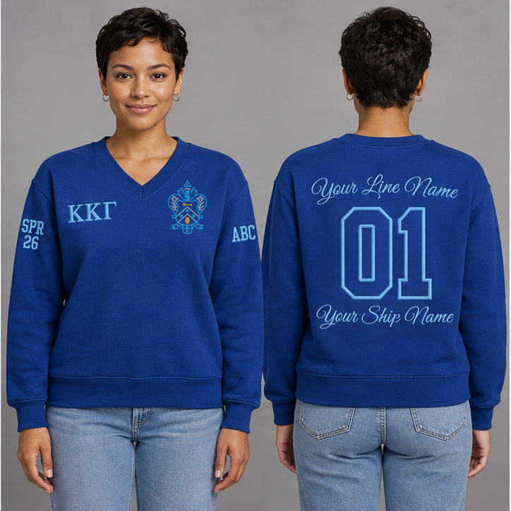 Kappa Kappa Gamma Kappa Blue V-neck sweatshirt on an adult model with Gamma Blue Greek letters ΚΚΓ, original supplied crest, sample line name, number 01 and ship name, crossing year and chapter initials on sleeves.
