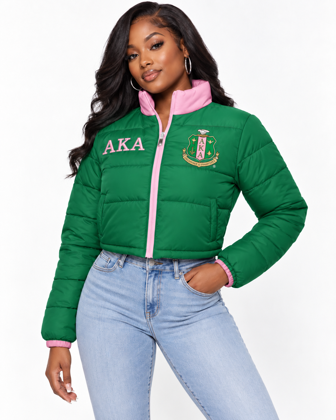 Alpha Kappa Alpha green cropped puffer jacket with pink trim and custom embroidery on female model