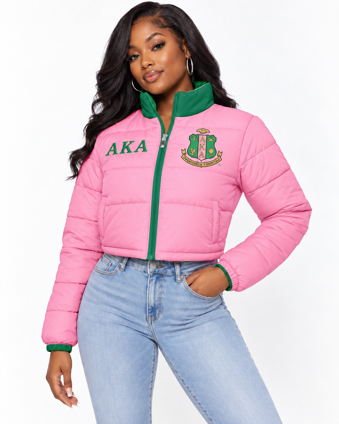 Alpha Kappa Alpha pink cropped puffer jacket with green trim and custom embroidery on female model