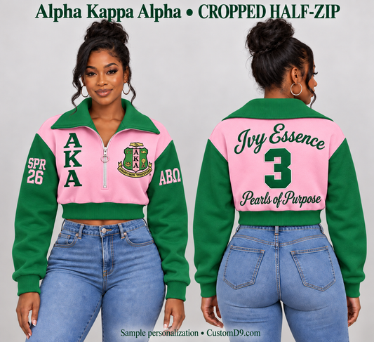 Alpha Kappa Alpha pink and green cropped wide-collar half-zip sweatshirt, front and back model views with sample custom embroidery