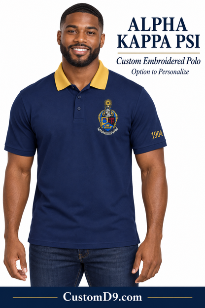 Male model wearing an Alpha Kappa Psi navy blue and gold custom embroidered polo
