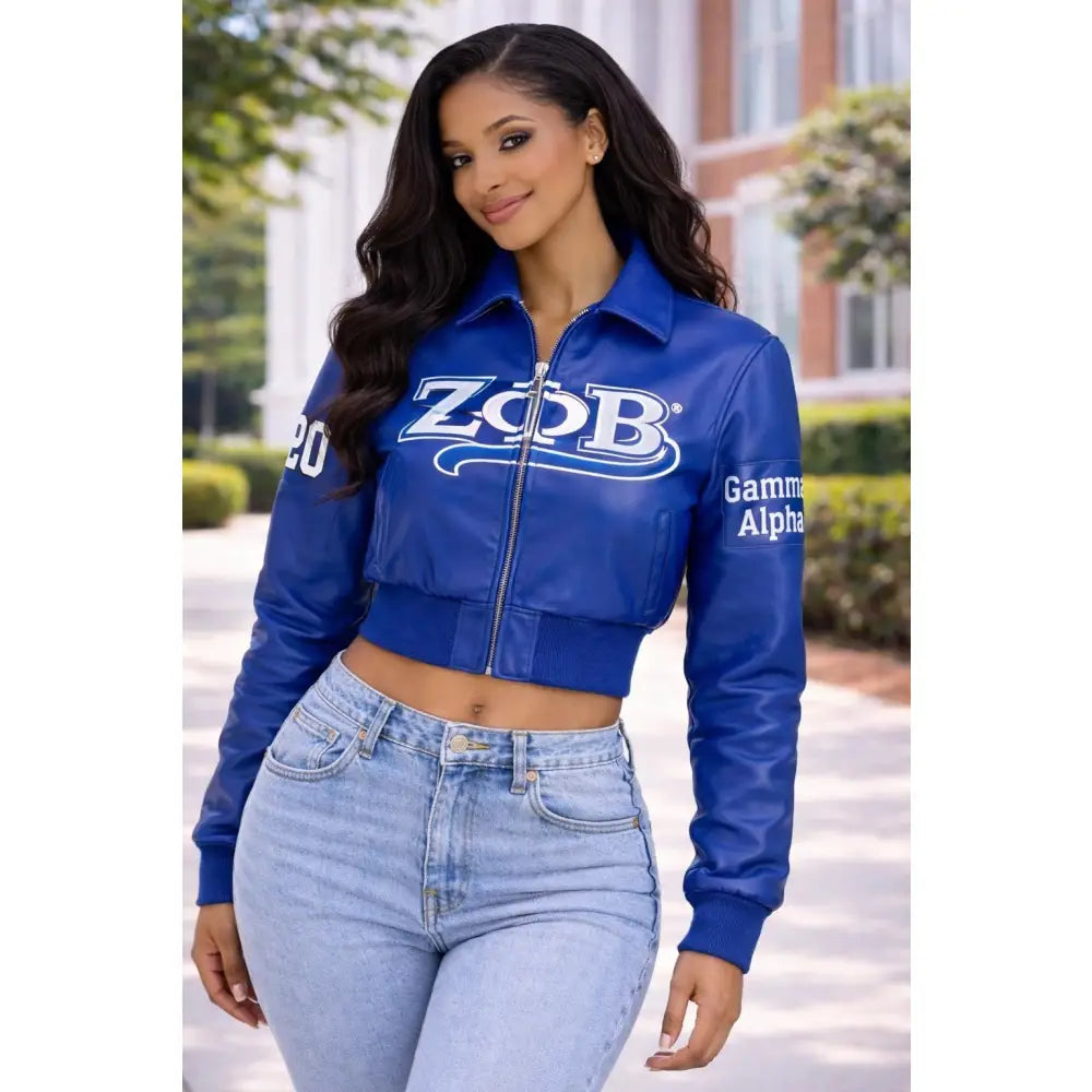 Model wearing a royal blue Zeta Phi Beta leather crop jacket