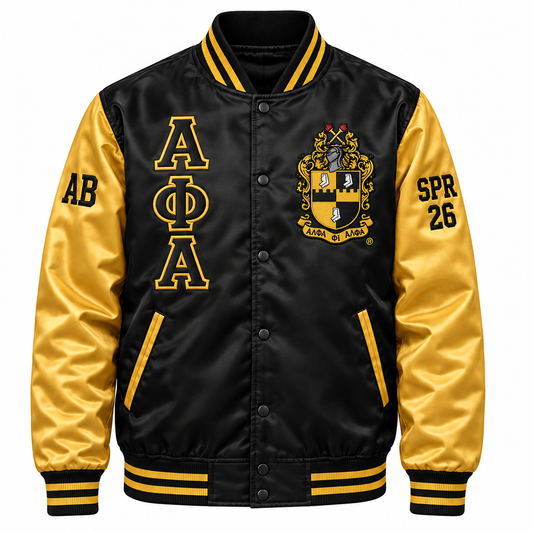 Black and gold Alpha Phi Alpha satin bomber jacket with crest, stacked letters and sleeve embroidery