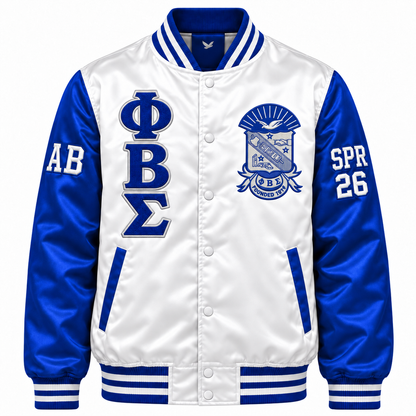 White and royal blue Phi Beta Sigma satin bomber jacket with crest, stacked letters and sleeve embroidery