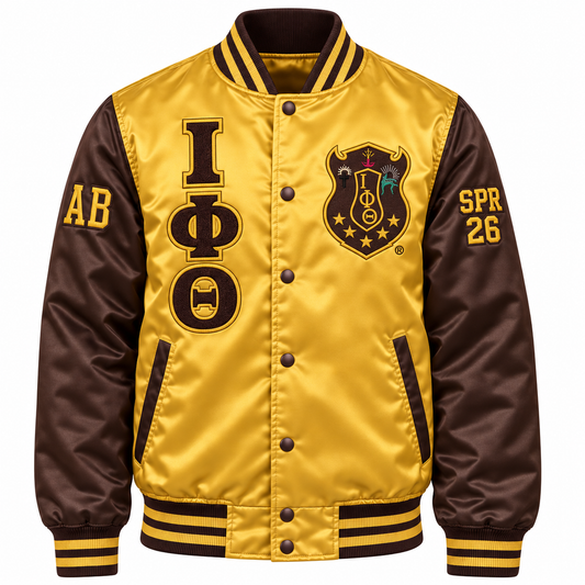Iota Phi Theta gold and brown satin bomber jacket with crest, stacked letters and sleeve embroidery