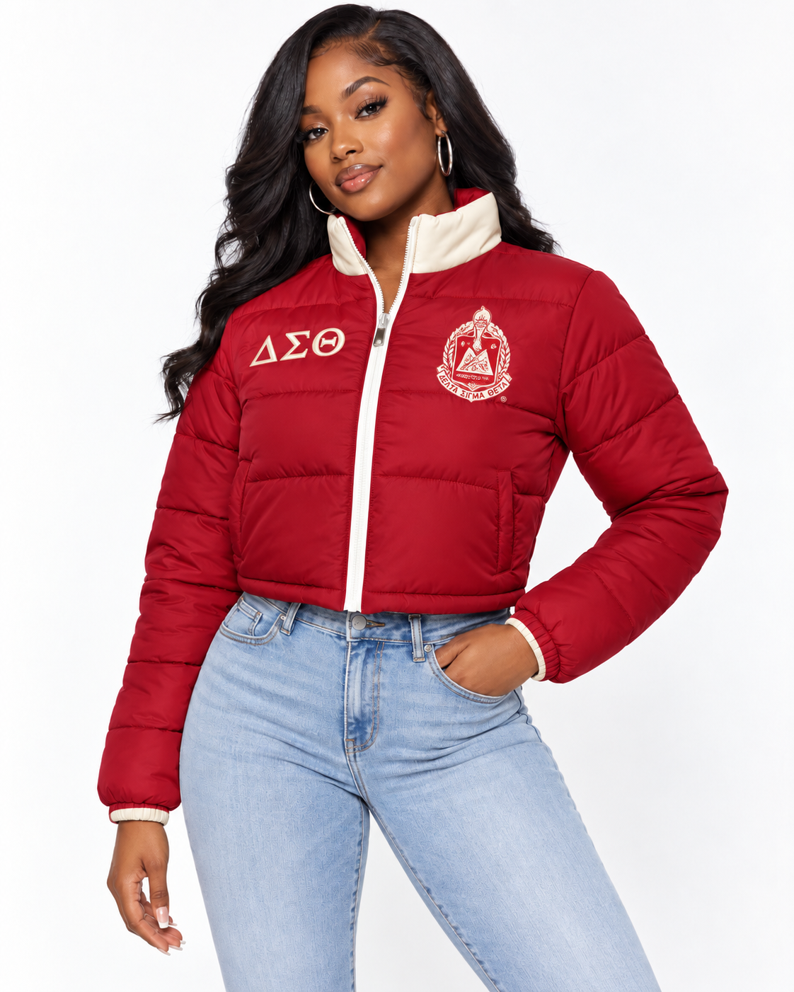 Delta Sigma Theta crimson cropped puffer jacket with cream trim and custom embroidery on female model