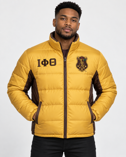 Iota Phi Theta gold puffer jacket with brown trim and custom embroidery on male model