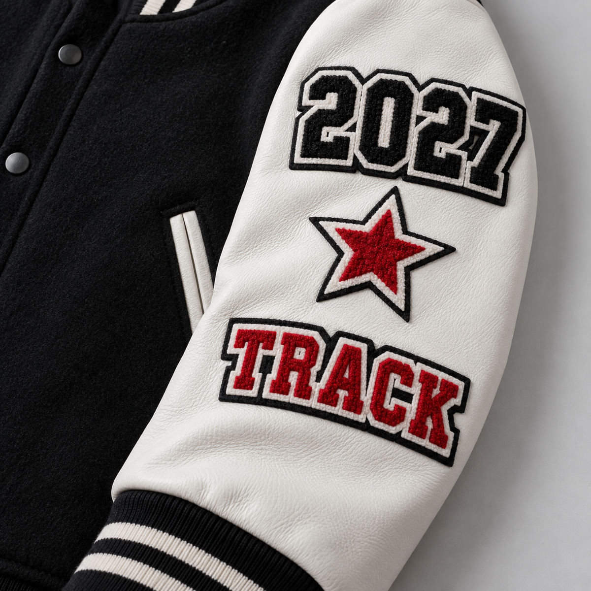 Students wearing navy and red personalized high school letterman jackets