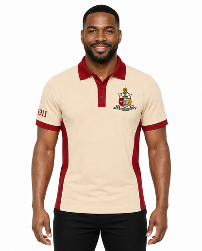 Studio model wearing a Kappa Alpha Psi cream and crimson embroidered panel polo