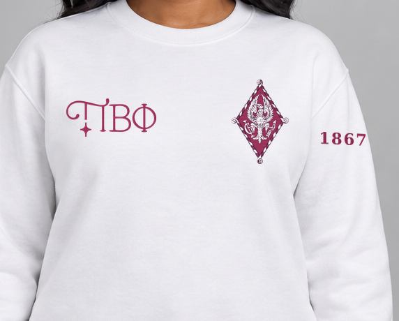Pi Beta Phi premium embroidered white solid crewneck sweatshirt on model - chest embroidery close-up
