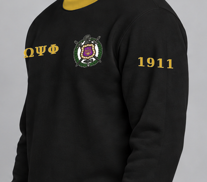 Omega Psi Phi premium embroidered black solid contrast trim crewneck sweatshirt on model - founding year sleeve detail