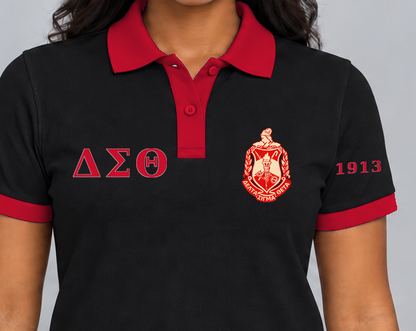 Delta Sigma Theta premium embroidered black solid contrast trim polo on model - chest embroidery close-up