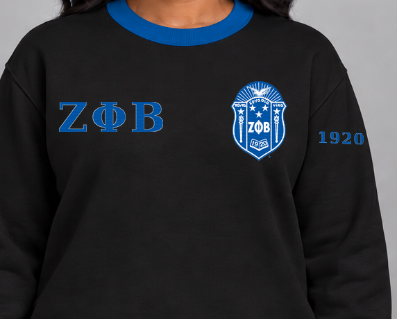Zeta Phi Beta premium embroidered black solid contrast trim crewneck sweatshirt on model - chest embroidery close-up