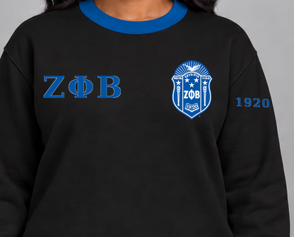 Zeta Phi Beta premium embroidered black solid contrast trim crewneck sweatshirt on model - chest embroidery close-up