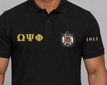 Omega Psi Phi premium embroidered black solid polo on model - chest embroidery close-up