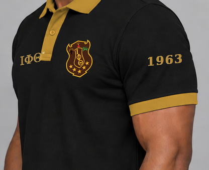 Iota Phi Theta premium embroidered black solid contrast trim polo on model - founding year sleeve detail