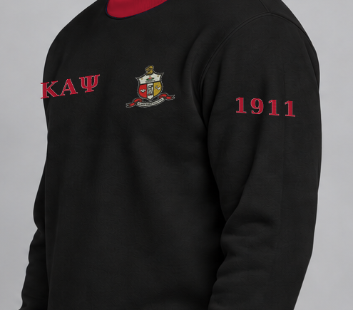 Kappa Alpha Psi premium embroidered black solid contrast trim crewneck sweatshirt on model - founding year sleeve detail