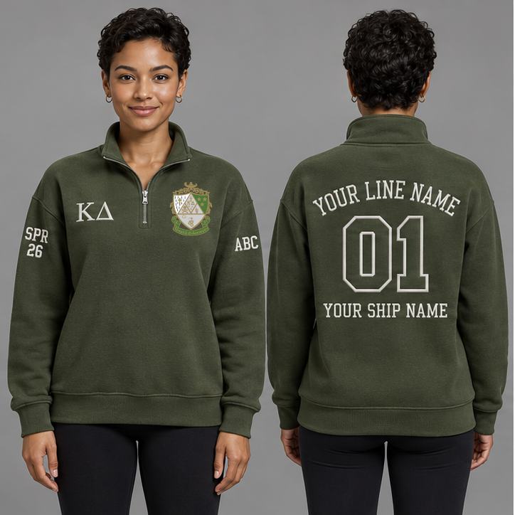 Kappa Delta Olive Green and Pearl White personalized quarter-zip sweatshirt on an adult model, original supplied crest and ΚΔ letters, sample line name, line number01, ship name, crossing year and chapter initials.