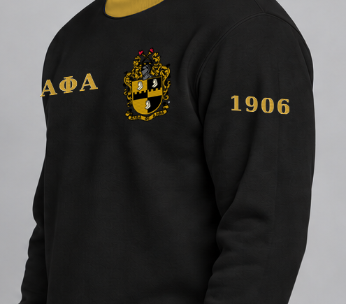Alpha Phi Alpha premium embroidered black solid contrast trim crewneck sweatshirt on model - founding year sleeve detail