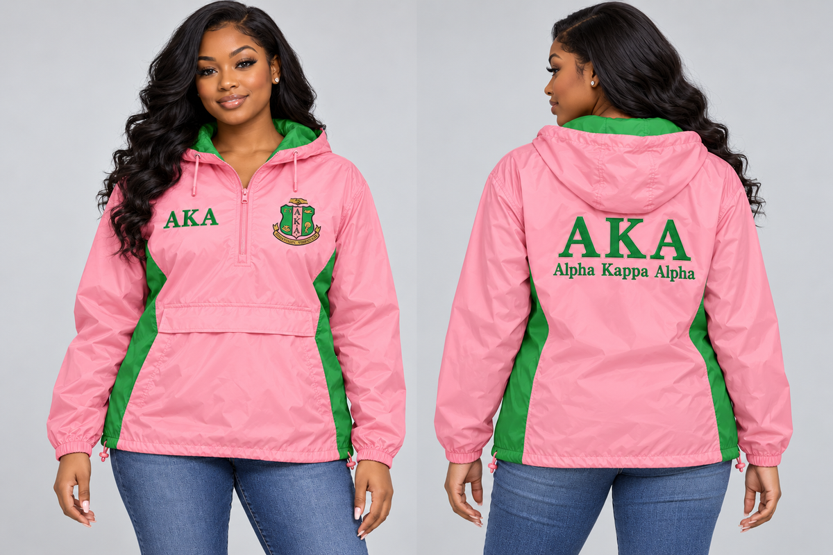 Black woman modeling Alpha Kappa Alpha salmon pink and apple green custom embroidered hooded anorak windbreaker jacket, front and back views.