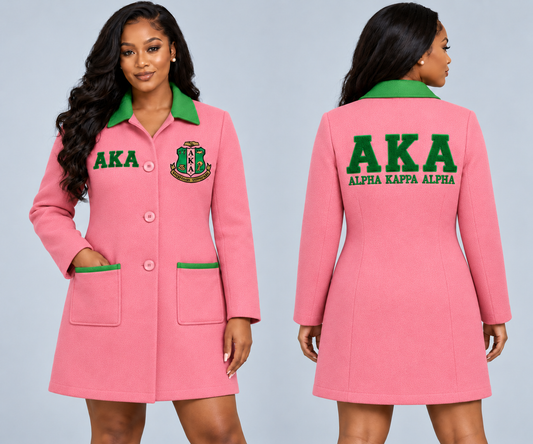 Black woman modeling Alpha Kappa Alpha salmon pink and apple green fitted premium wool blend coat with chenille Greek letters and embroidered crest, front and back views.
