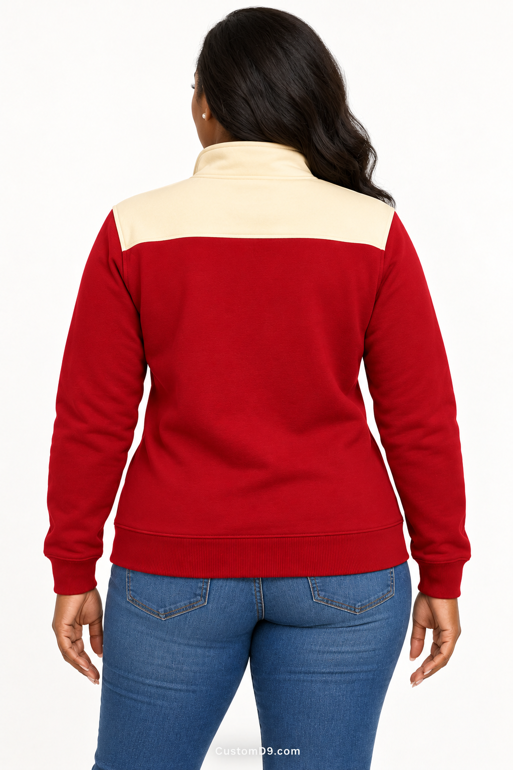 Black female model showing back of Delta Sigma Theta crimson quarter-zip with cream shoulder panel