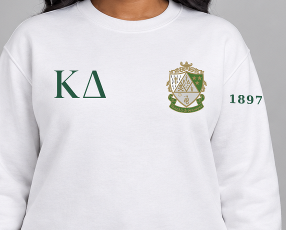 Kappa Delta premium embroidered white solid crewneck sweatshirt on model - chest embroidery close-up