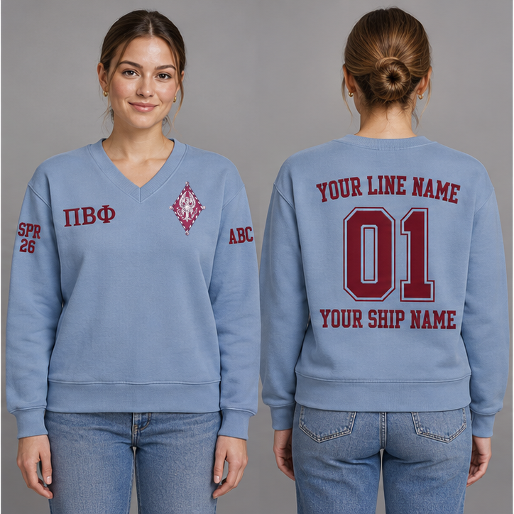 Pi Beta Phi Silvery Blue V-neck sweatshirt on an adult model with Wine Greek letters ΠΒΦ, original supplied crest, sample line name, number 01 and ship name, crossing year and chapter initials on sleeves.