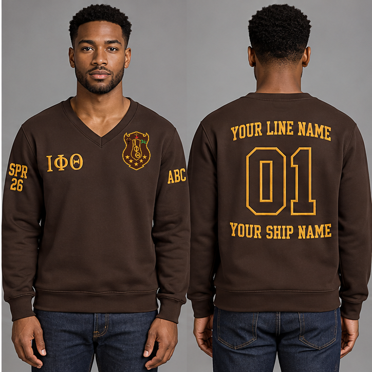 Iota Phi Theta Charcoal Brown V-neck sweatshirt on an adult model with Gilded Gold Greek letters ΙΦΘ, original supplied crest, sample line name, number 01 and ship name, crossing year and chapter initials on sleeves.