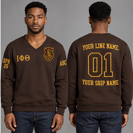 Iota Phi Theta Charcoal Brown V-neck sweatshirt on an adult model with Gilded Gold Greek letters ΙΦΘ, original supplied crest, sample line name, number 01 and ship name, crossing year and chapter initials on sleeves.