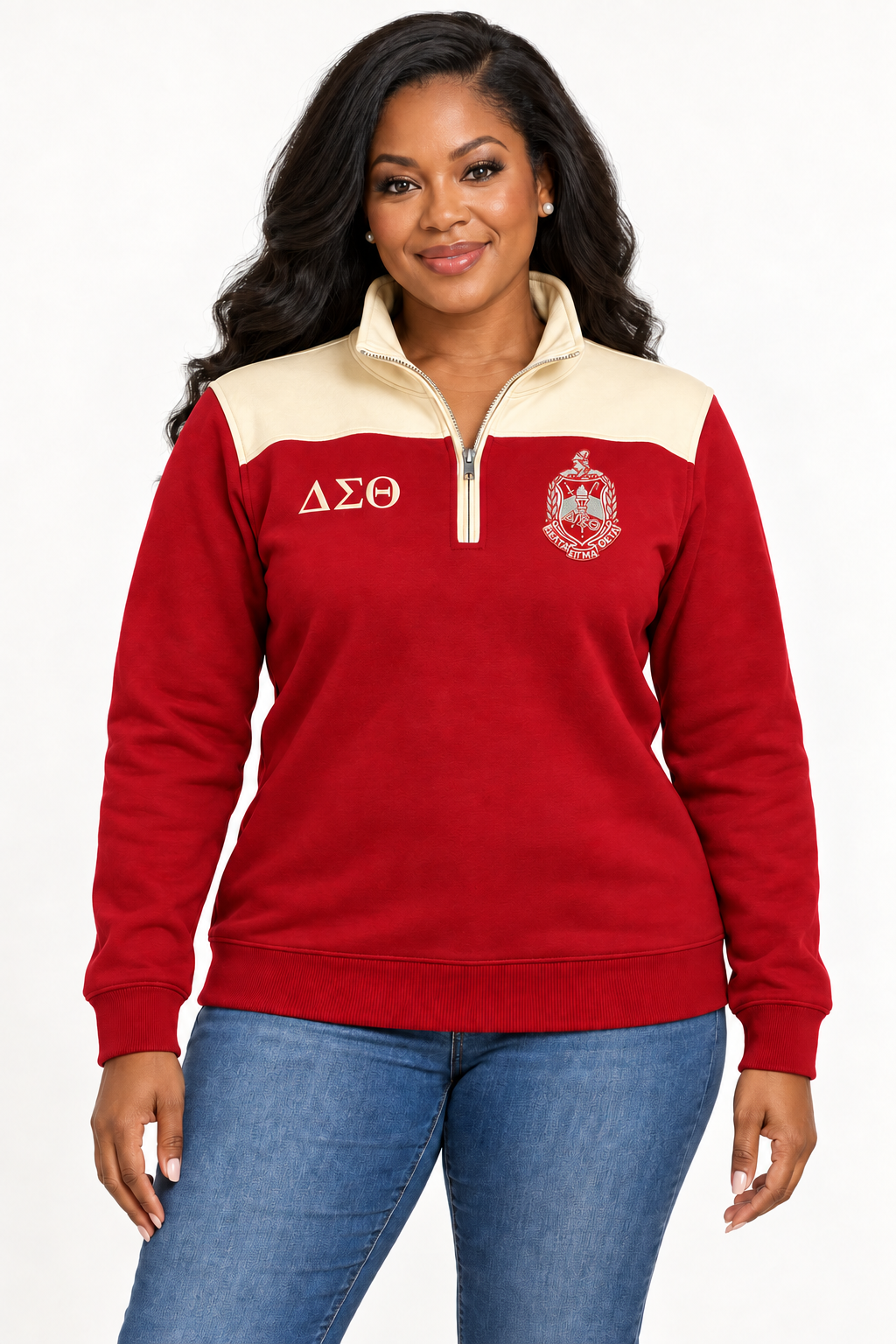 Black female model showing front of Delta Sigma Theta crimson quarter-zip with cream shoulder panel