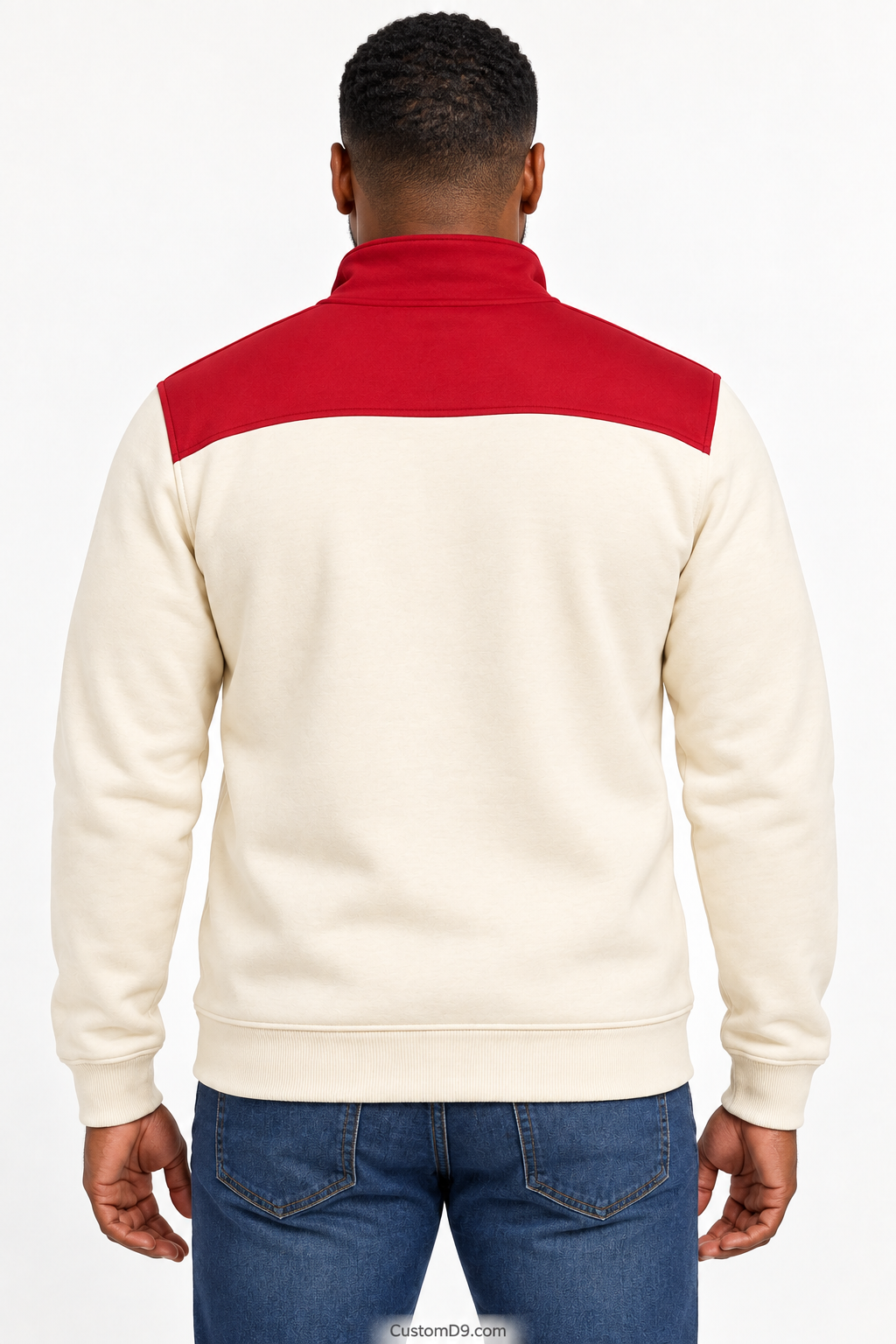 Black male model showing back of Kappa Alpha Psi cream quarter-zip with crimson shoulder panel