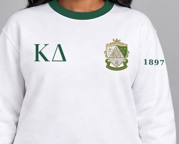 Kappa Delta premium embroidered white solid contrast trim crewneck sweatshirt on model - chest embroidery close-up