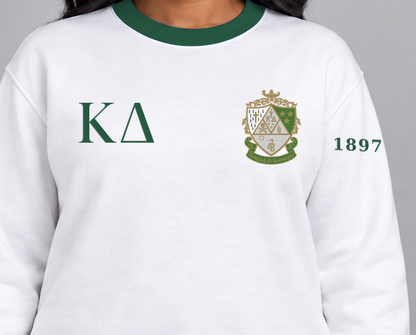 Kappa Delta premium embroidered white solid contrast trim crewneck sweatshirt on model - chest embroidery close-up