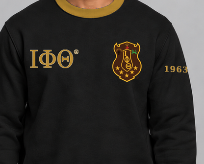 Iota Phi Theta premium embroidered black solid contrast trim crewneck sweatshirt on model - chest embroidery close-up