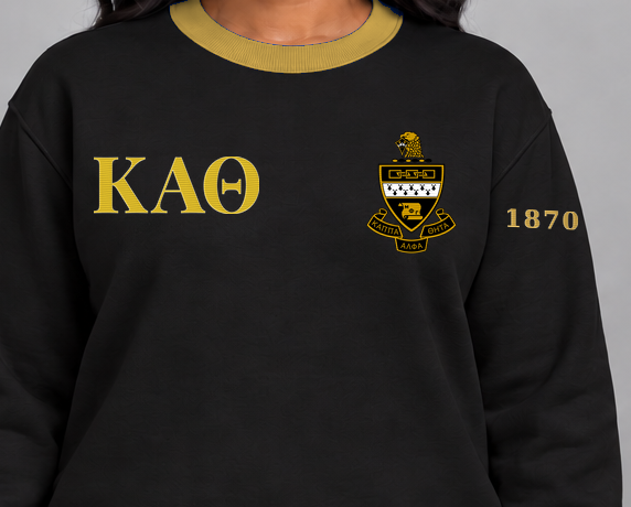 Kappa Alpha Theta premium embroidered black solid contrast trim crewneck sweatshirt on model - chest embroidery close-up