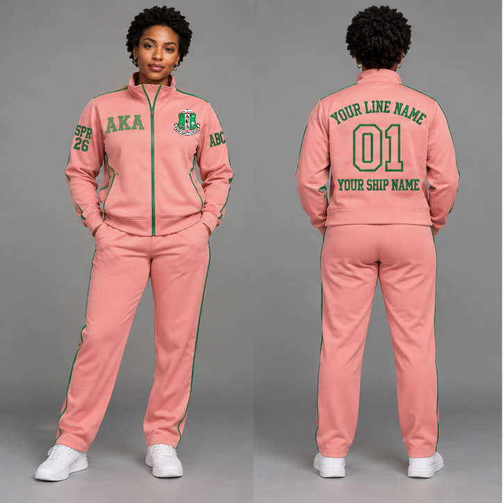 Alpha Kappa Alpha Salmon Pink and Apple Green personalized track suit on an adult model, original supplied crest and ΑΚΑ letters, sample line name, line number 01, ship name, crossing year and chapter initials.