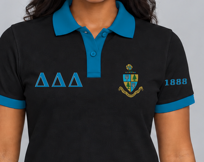 Delta Delta Delta premium embroidered black solid contrast trim polo on model - chest embroidery close-up
