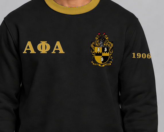 Alpha Phi Alpha premium embroidered black solid contrast trim crewneck sweatshirt on model - chest embroidery close-up