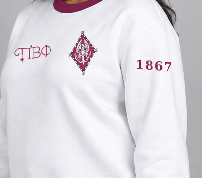 Pi Beta Phi premium embroidered white solid contrast trim crewneck sweatshirt on model - founding year sleeve detail