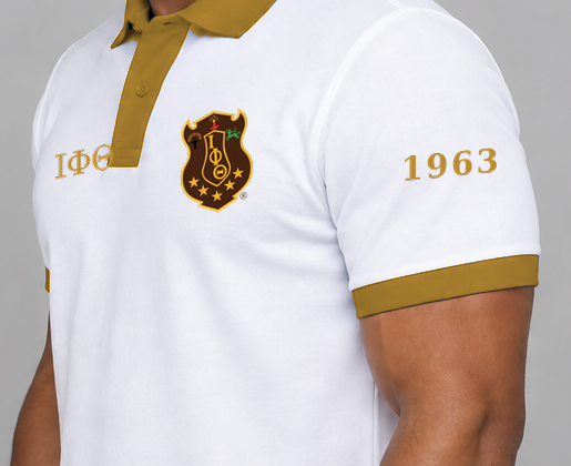 Iota Phi Theta premium embroidered white solid contrast trim polo on model - founding year sleeve detail