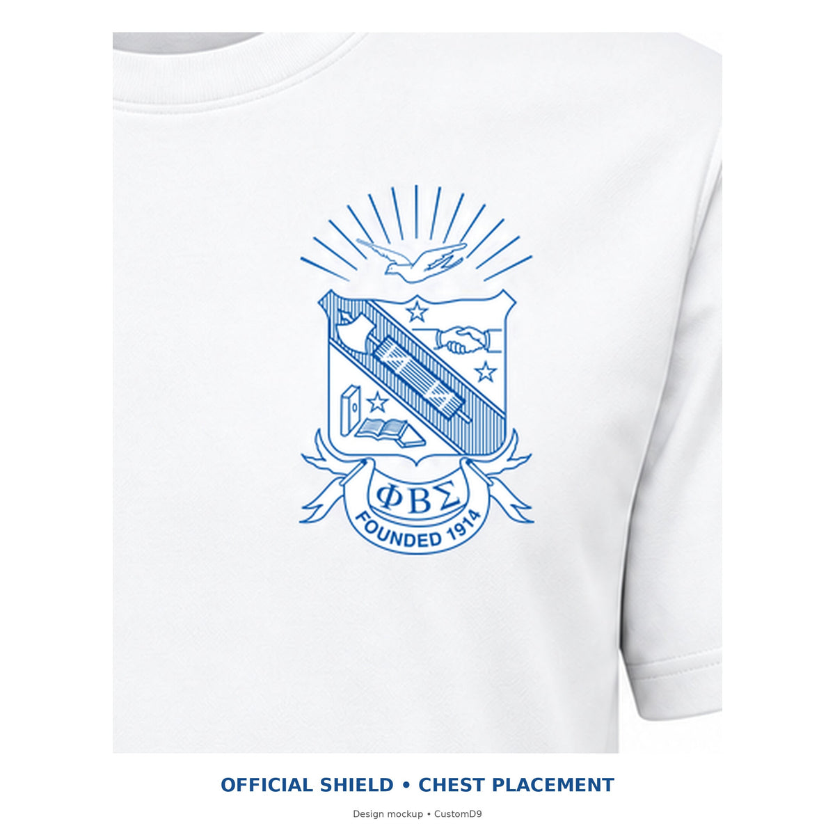 Digital artwork placement detail of the original Phi Beta Sigma shield on the white T-shirt's left chest