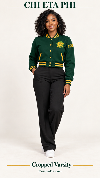 Chi Eta Phi Cropped Varsity dark green gold shield crest version on model