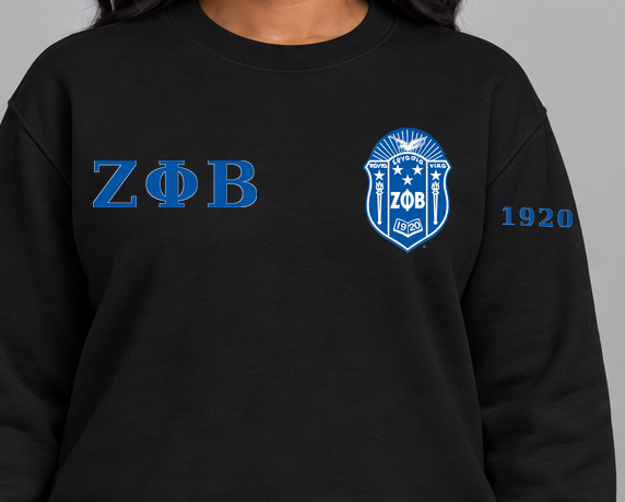 Zeta Phi Beta premium embroidered black solid crewneck sweatshirt on model - chest embroidery close-up