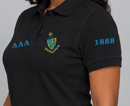 Delta Delta Delta premium embroidered black solid polo on model - founding year sleeve detail