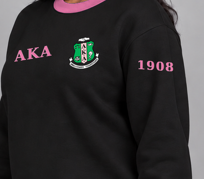 Alpha Kappa Alpha premium embroidered black solid contrast trim crewneck sweatshirt on model - founding year sleeve detail