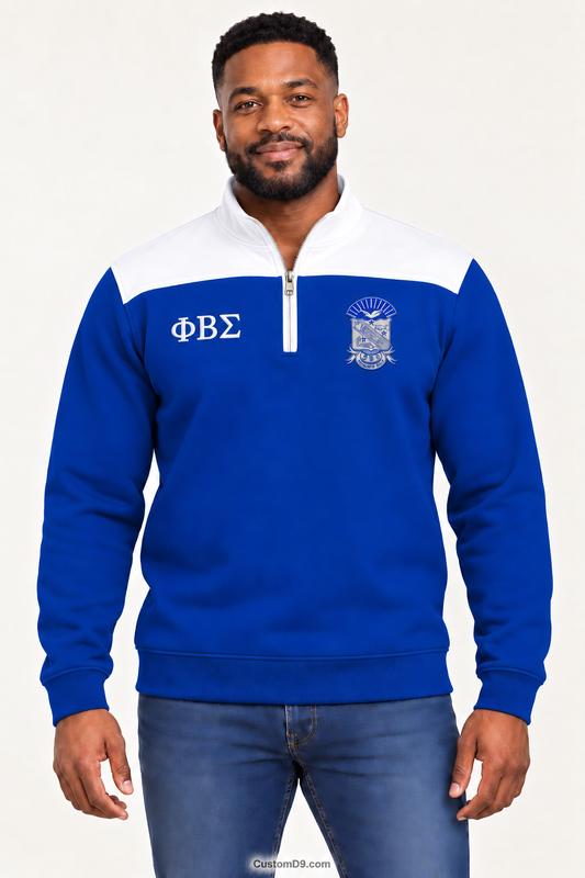 Black male model showing front of Phi Beta Sigma royal blue quarter-zip with white shoulder panel
